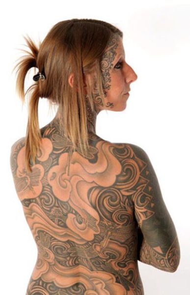 Divorcee Celebrates By Tattooing Entire Body