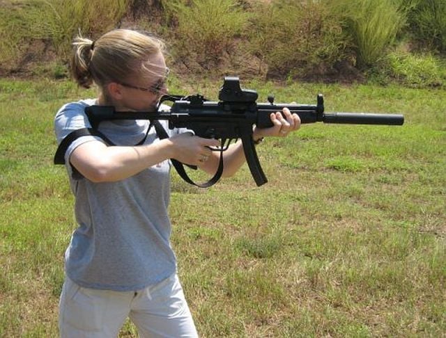 Cute Girls and Guns Go Well Together