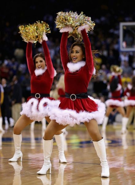 Cheerleading Snow Maidens Spread the Christmas Spirit