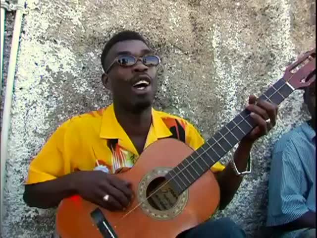 Singing and Playing the Guitar with One String like a Boss 