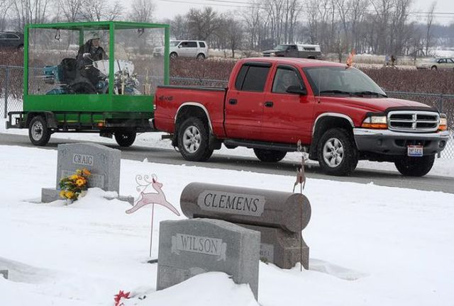 Biker Buried Riding His Harley Davidson
