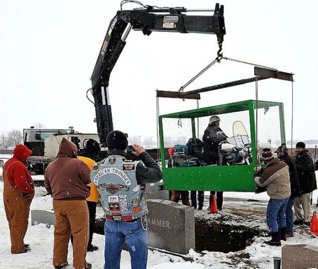 Biker Buried Riding His Harley Davidson