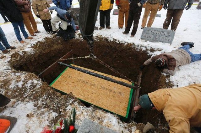Biker Buried Riding His Harley Davidson