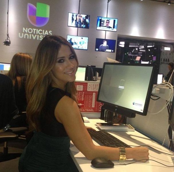 The Beautiful Busty Brunette Who Presents the Weather