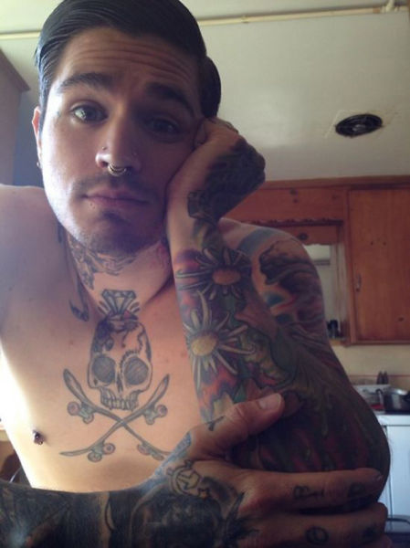 Tattoo Lovers Gather around for Epic Body Art