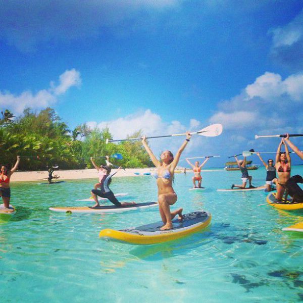 Surfboard Yoga Is a Fun New Form of Beach Exercise