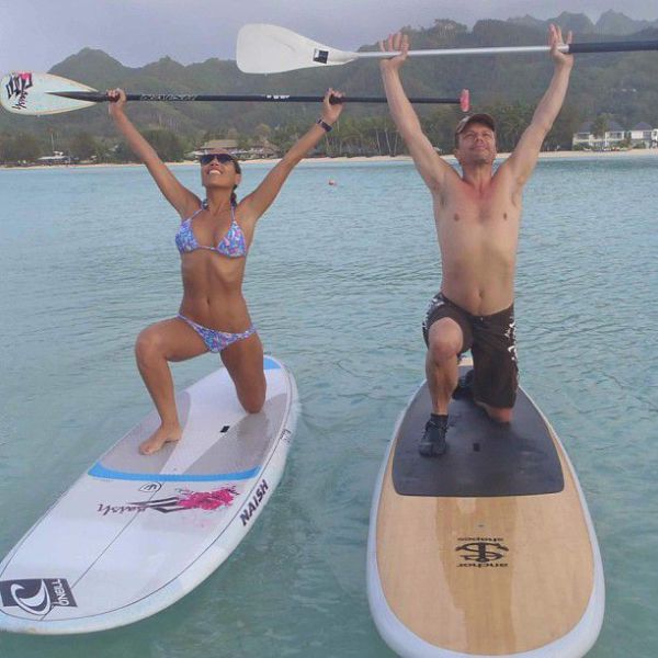 Surfboard Yoga Is a Fun New Form of Beach Exercise