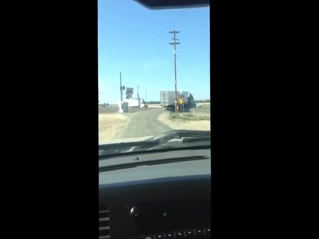 Train Destroys Truck Stuck on the Railways (VIDEO)