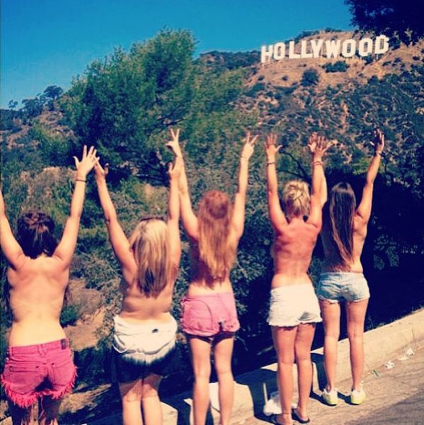 Topless Holiday Snaps Are the Newest Internet Trend