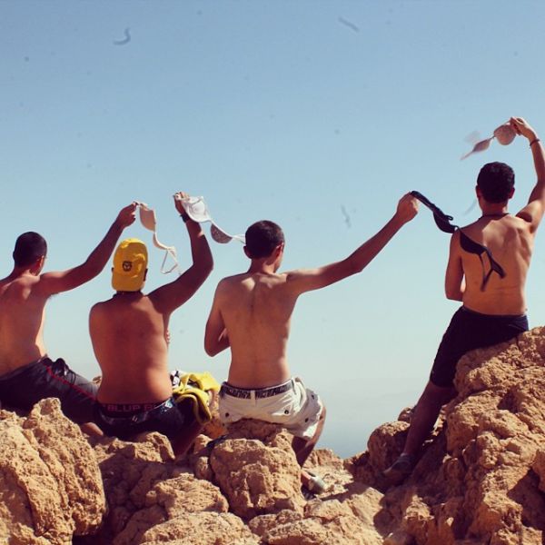 Topless Holiday Snaps Are the Newest Internet Trend