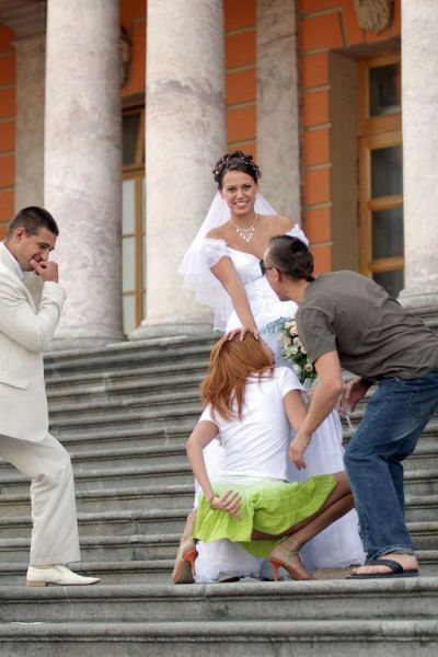 Drunk Bridesmaid Turns Cheeky in Wedding Photos