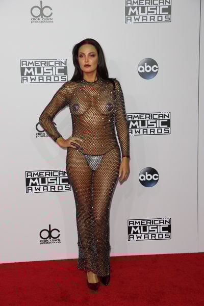 Albanian Singer Arrives at AMA’s Wearing Almost Nothing