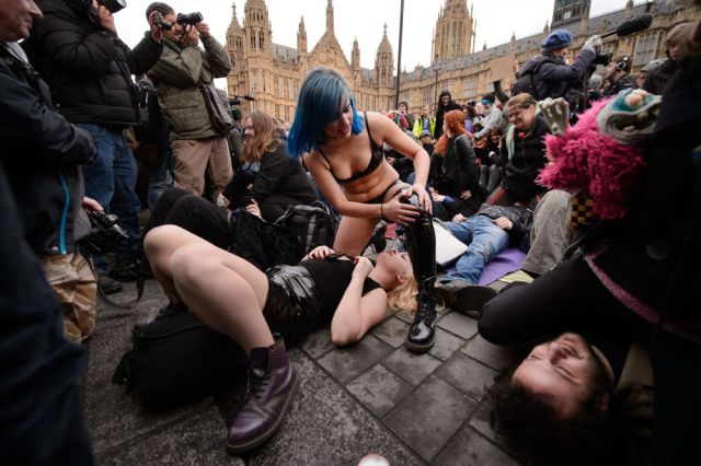 A Bizarre Face Sitting Protest outside British Parliament