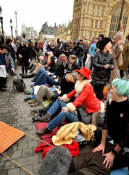 A Bizarre Face Sitting Protest outside British Parliament