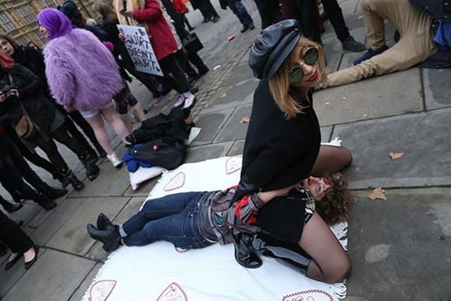 A Bizarre Face Sitting Protest outside British Parliament