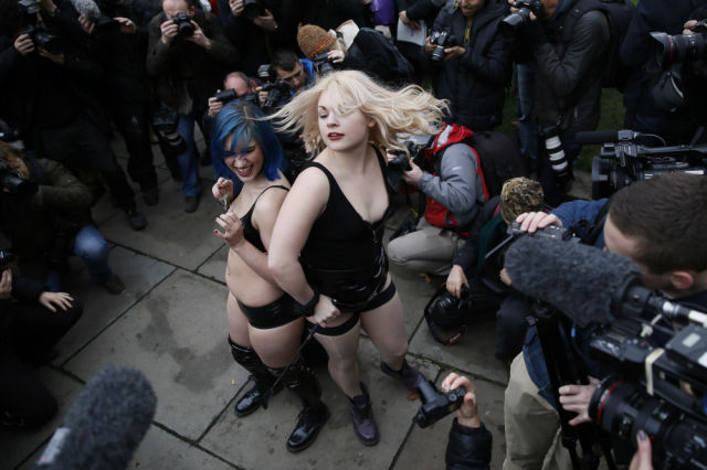 A Bizarre Face Sitting Protest outside British Parliament