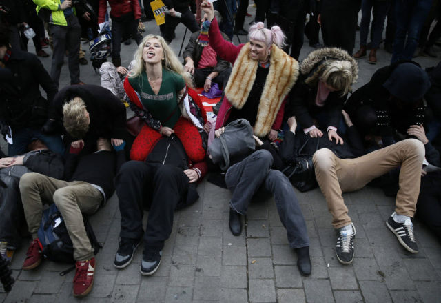 A Bizarre Face Sitting Protest outside British Parliament