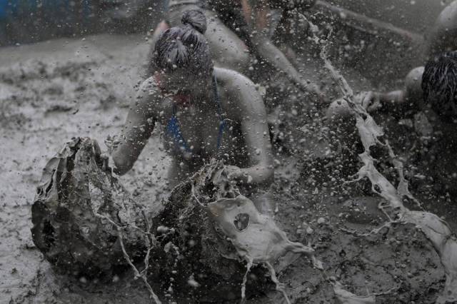Partiers Get Crazy Messy at the South Korean Mud Festival