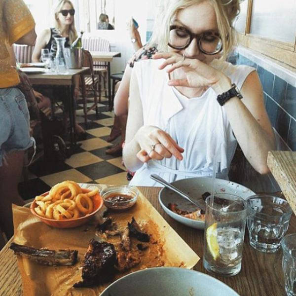 Some Hot Ladies Tuck into Some BBQ