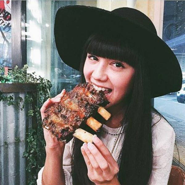 Some Hot Ladies Tuck into Some BBQ